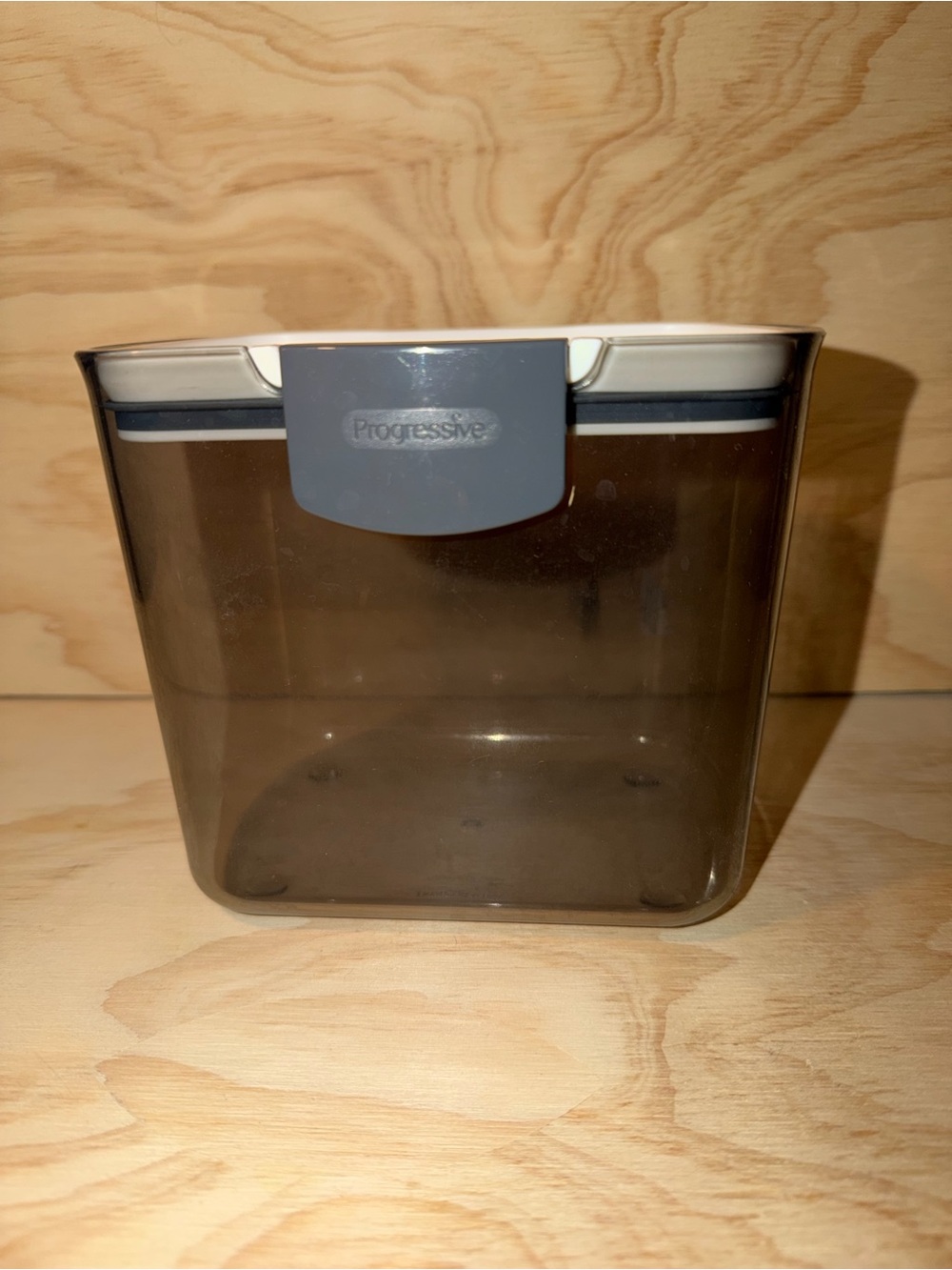 Progressive prokeeper coffee canister with tinted plastic